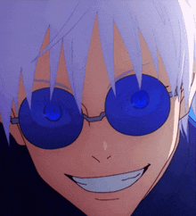 a close up of a person 's face with blue glasses