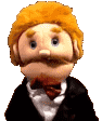 a puppet with red hair and a mustache is wearing a suit and tie .