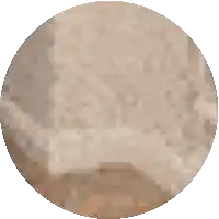 a pixelated image of a circle with a few spots on it