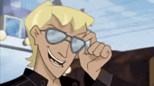 a cartoon character wearing sunglasses is smiling