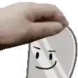a hand is holding a mirror with a smile on its face .