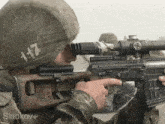 a soldier with the number 1:17 on his hat
