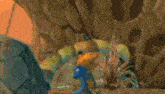 a cartoon character is flying through the air in a video game while being hit by lightning .