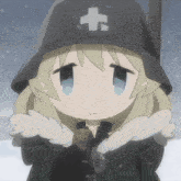 a girl wearing a helmet with a cross on it