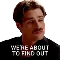 a man with a mustache has the words we 're about to find out written on his face