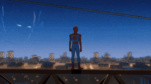a man in a spiderman costume is standing on a bridge overlooking a city