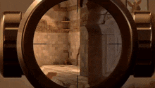 a sniper scope shows a person standing in a room