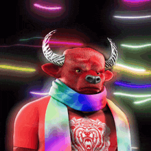 a red bull wearing a rainbow scarf and a red shirt with a bear on it