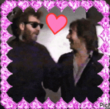a picture of two men shaking hands with a pink heart in the middle