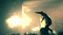 a man is jumping in front of a sign that says ' exit '