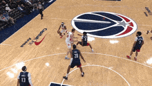 a basketball game is being played in the capital arena