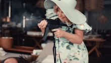 Firing Gun Jennifer Coolidge GIF - Firing Gun Jennifer Coolidge Carol GIFs