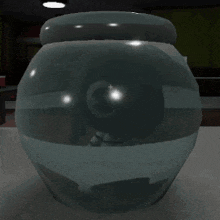 a glass jar with a reflection of a person in it