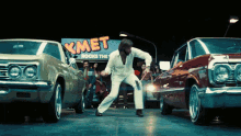 Smashing Cars Jon Peters GIF - Smashing Cars Jon Peters Bradley Cooper GIFs