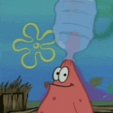 a spongebob squarepants cube with patrick and spongebob in the background