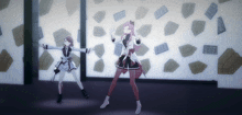 two anime girls are dancing in front of a wall that has a lot of numbers on it