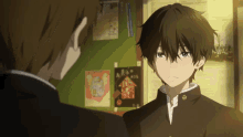 two anime characters are standing next to each other in front of a bulletin board with chinese writing
