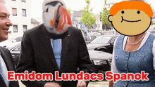 a man in a suit with a fish on his head and the words emidom lundacs spanok written on the bottom