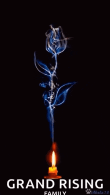 a blue rose with smoke coming out of it and a candle .