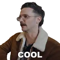 a man with glasses and a mustache is wearing a jacket that says cool on it