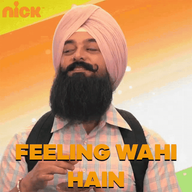 a man with a beard wearing a turban says 