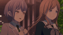 two anime girls are standing next to each other and one of them has a surprised look on her face