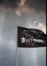 a devil 's muse flag with a skull on it