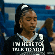 a woman in a ponytail says " i 'm here to talk to you "