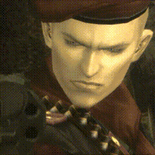 a close up of a man 's face with a red hat on