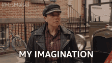 a woman wearing a leather jacket and hat says my imagination