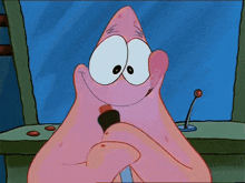 patrick star from spongebob squarepants is smiling and holding a lipstick