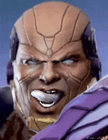 a close up of a man 's face with a purple helmet on .