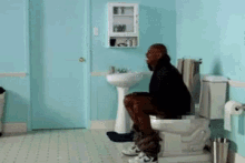 Dave Chappelle Toilet GIF - Dave Chappelle Toilet Sitting GIFs