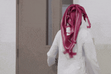 a door is open to a room with a sign on the wall that says ' arabic ' on it