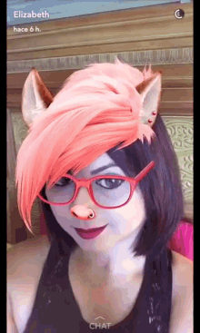 a woman with pink hair and red glasses says elizabeth