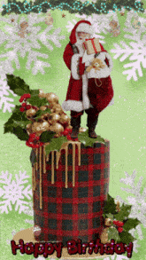 a christmas cake with santa on top and the words happy birthday