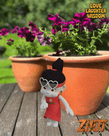 a doll wearing heart shaped sunglasses stands in front of a potted plant with the words love laughter wisdom written above it
