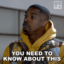 a man wearing a yellow hoodie has the words you need to know about this below him