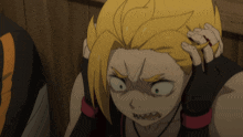 a cartoon character with yellow hair holds his head