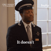 a man in a suit says it does n't in front of a window