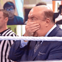 paul heyman covers mouth shocked stunned surprised