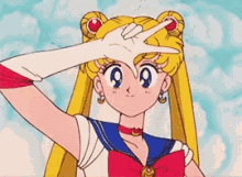 sailor moon is making a peace sign with her hand over her face .