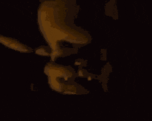 a dark brown background with a few white dots on it