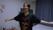 a woman wearing a black hard rock t-shirt