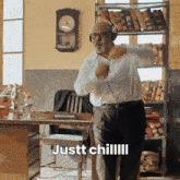 a man wearing headphones says justt chilll