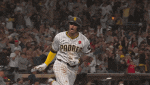 a baseball player wearing a san diego padres uniform