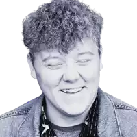 a black and white photo of a smiling woman with curly hair