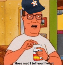 king of the hill is wearing a baseball cap and holding a can of soda .