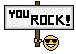 a pixel art sign that says `` you rock ! ''