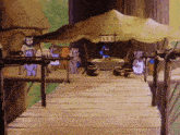 a group of monkeys are standing around a table with a sign that says ' aa ' on it